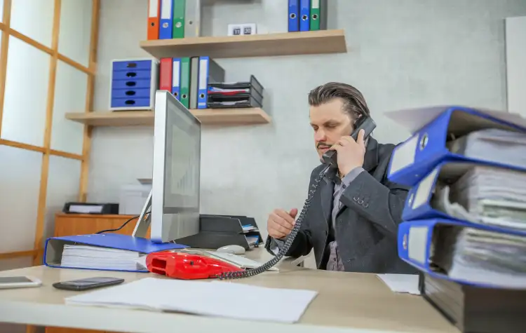 Office administration professional at a workstation