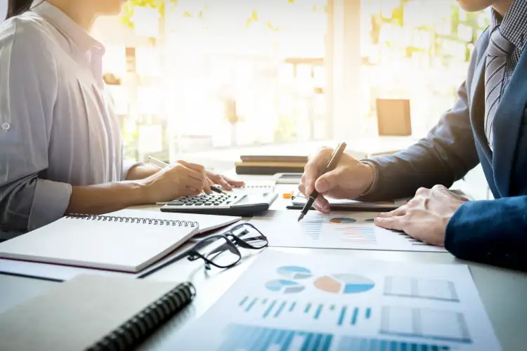 Accounting professional reviewing financial reports