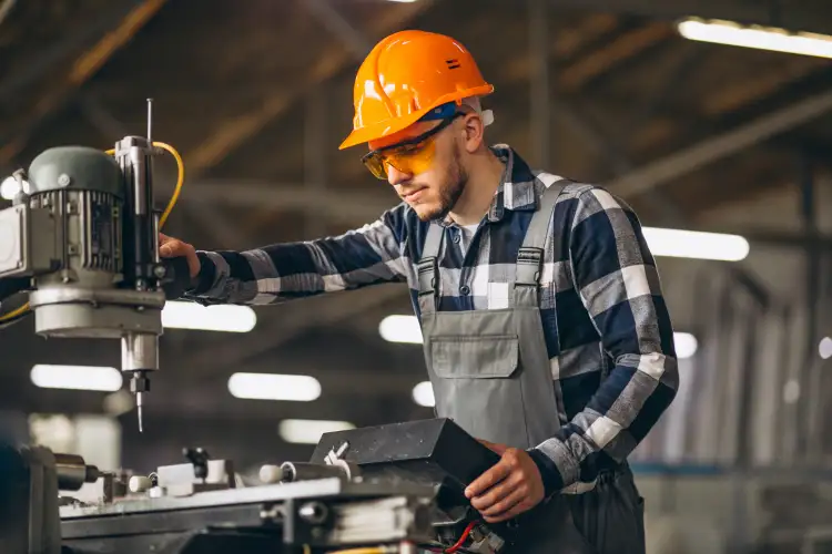 Manufacturing professional operating equipment on a production line